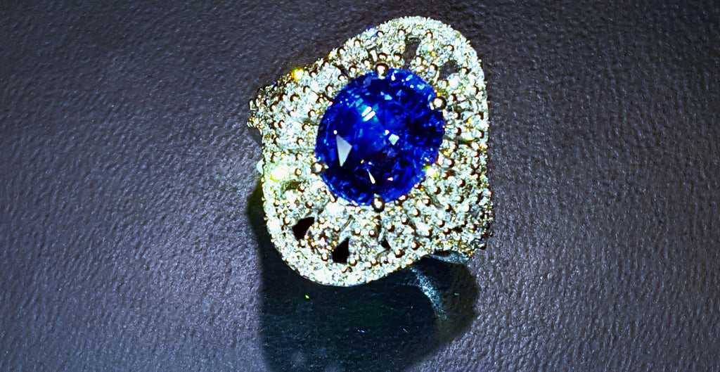 18kw 4.95ct Ceylon Sapphire ring with 1.98cts of diamonds
