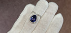 18k White + Yellow Gold with a Ceylon Purple Blue Sapphire Sounded in a Unique Diamond Swirl.