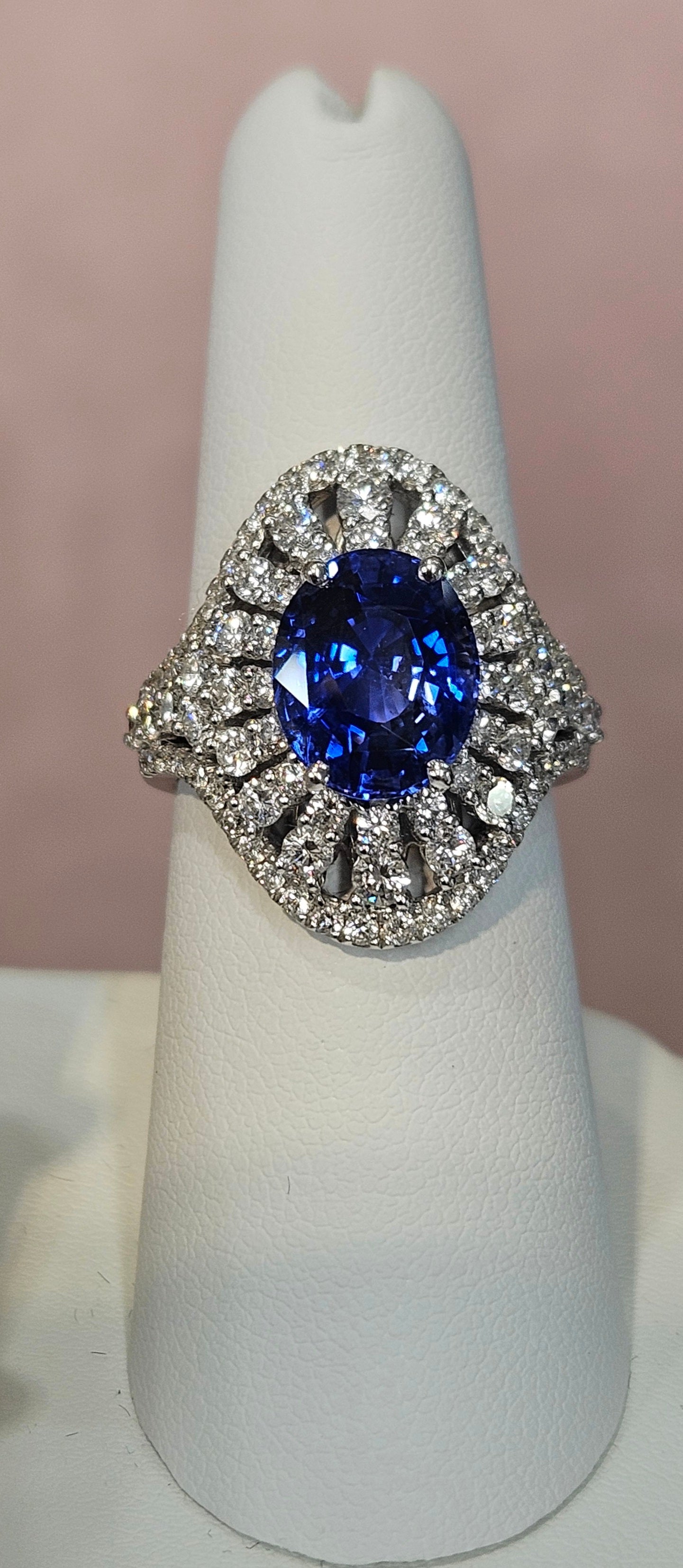 18kw 4.95ct Ceylon Sapphire ring with 1.98cts of diamonds