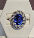 18kw fancy cocktail ring with 5.46ct Tanzanite and .392ct of diamonds